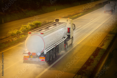 Fototapeta Motion blurred tanker truck on the highway.