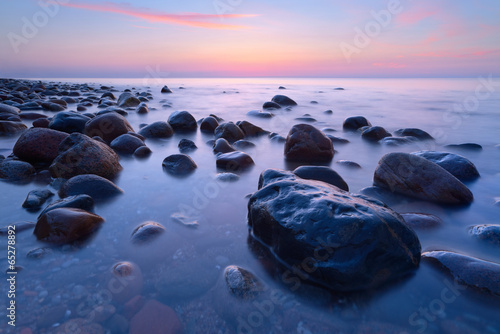 Fototapeta Beautiful stones in the ocean. The Baltic Sea coast, Poland.