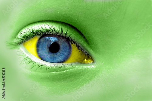 Fototapeta Eye with Brazil national colours concept