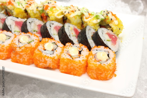 Fototapeta Sushi Roll on a white plate