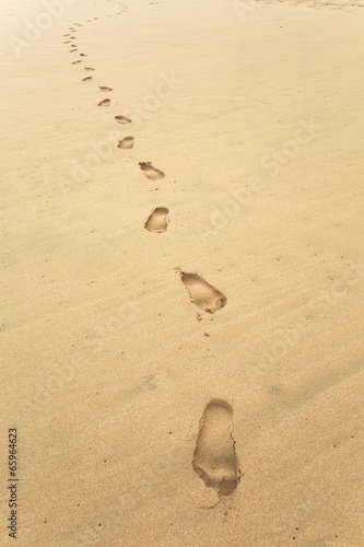 Fototapeta Footsteps in Sand