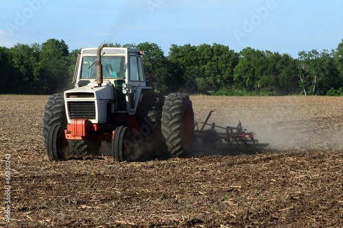  Farmer Tilling The Field