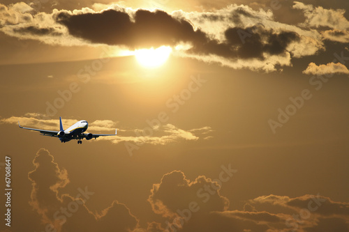 Silhouette of airplane with a beautiful sky