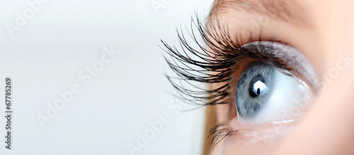 Female eye with long eyelashes close-up t-shirt