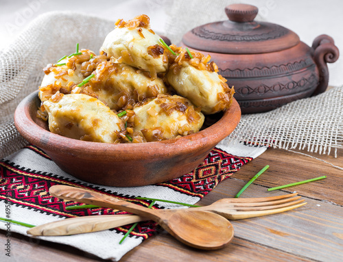 Ukrainian dumplings with cabbage, cheese and cherries
