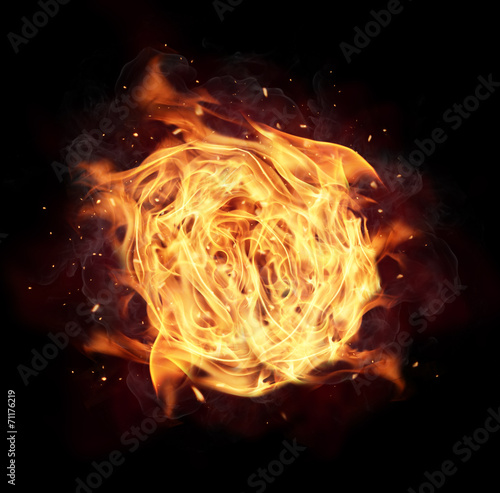 Fototapeta Fire ball isolated on black background