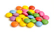 Colored smarties on white background