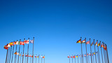 international flags against the sky poster