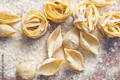 Poster raw pasta and flour