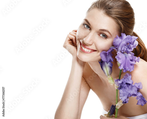 "Young beautiful smiling woman with blue-violet iris flower" Stockfotos und ...