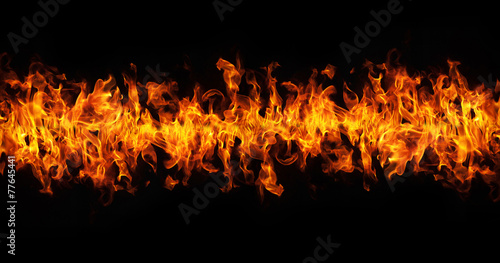 Fototapeta Fire flames on black background