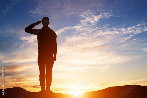 Soldier salute. Silhouette on sunset sky. Army, military. poster