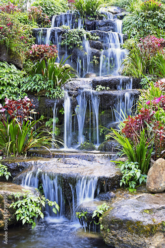  Artificial waterfall and statue at the garden
