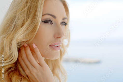 "Blond Woman on Windy Hill near Wind Farm" Stock photo and royalty-free ...