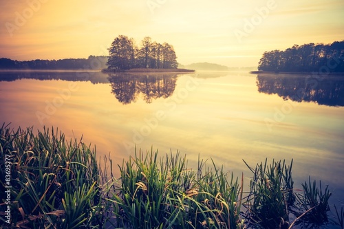 Obraz na płótnie Vintage photo of sunset lake