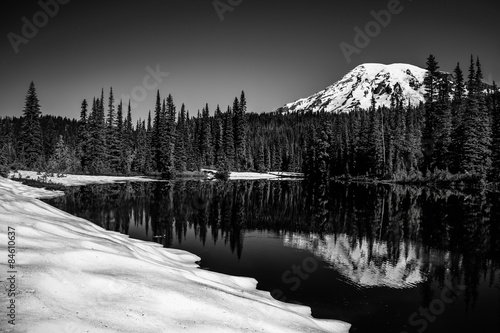 Mt Rainier in winter reflection in lake Poster