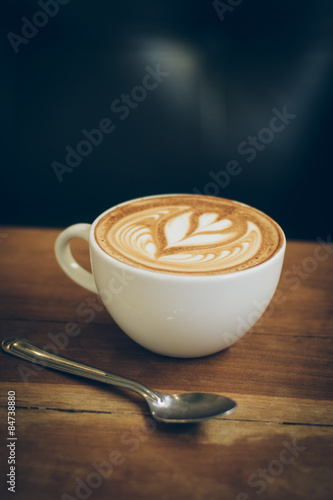 Zdjęcia coffee latte art on the wood desk