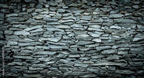 Abstract background of Stone wall vintage cool tone