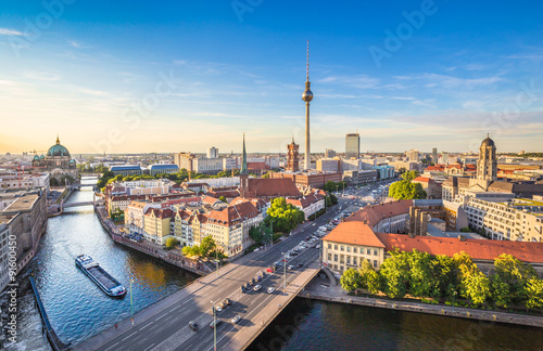 Poster Berlin skyline panorama with TV tower and Spree river at sunset, Germany