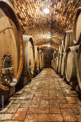  Oak barrels in a underground wine cellar