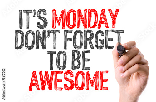 Hand with marker writing: Its Monday Don't Forget to be Awesome