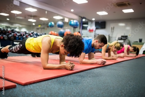 Zdjęcia Fit people working out in fitness class