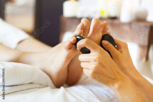 Poster, Tablou Massage of female foot in spa salon