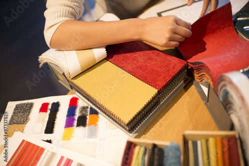 Women looking to take a sample fabric to hand
