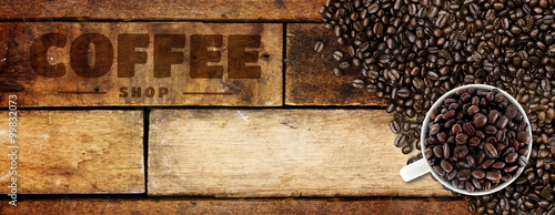  Coffee beans on wood background