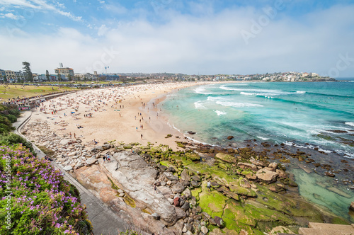 Poster Bondi Beach, Sydney, Australia - OCT 25, 2014: Tourists and swimmers relaxing on
