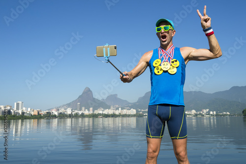 Poster Athlete taking selfie wearing gold medals with bright yellow emoji faces with sm