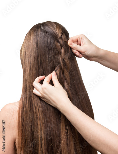 Poster Hands parekmahera braided plait for long hair isolated on white.