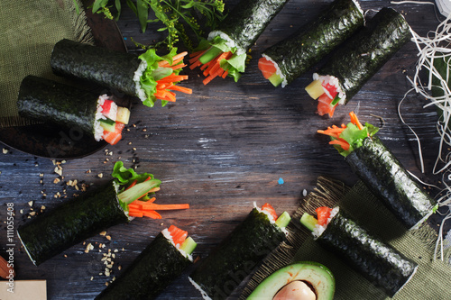 background Sushi rolls on top space for lettering does long