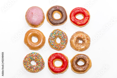Poster Colorful glazed donuts collection isolated on white background, top view