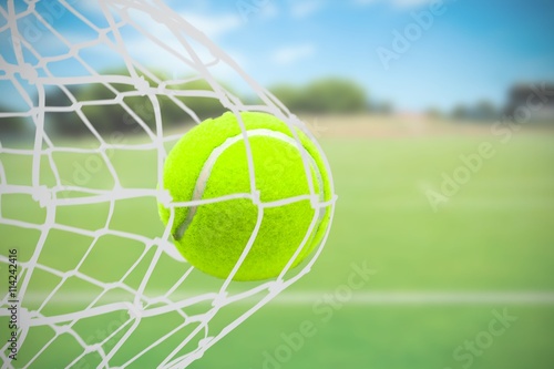 Obraz na plátně Composite image of tennis ball with a syringe