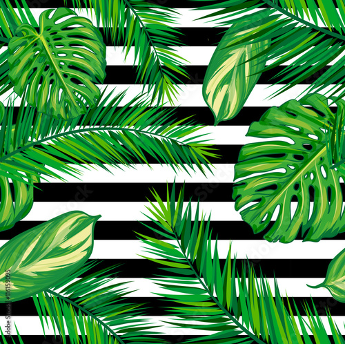 Fototapeta Beautiful seamless tropical jungle floral pattern background with palm leaves. Vector illustration.