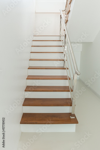 Fototapeta Interior - wood stairs and handrail