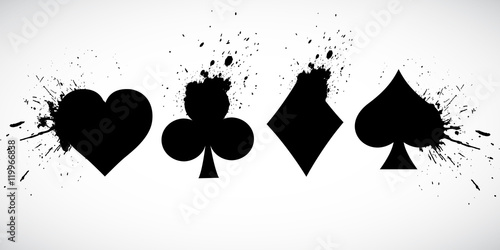 The suits of the deck of playing cards on a background of splashing. Grunge. © angelmaxmixam
