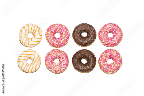 Poster Colorful glazed donuts isolated on white background, top view