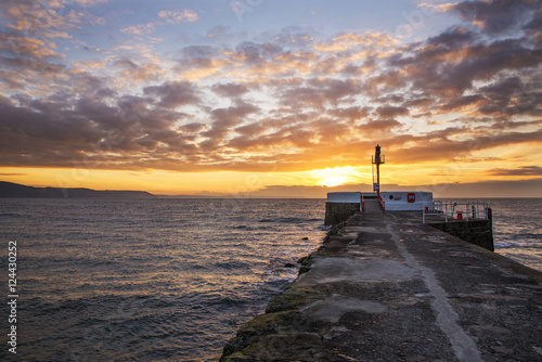Poster Sunrise with Pier in foreground and beautiful cloudy sky , Looe, Cornwall, UK