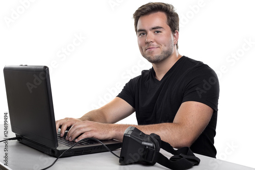 Poster Virtual Reality app developer working with a headset and a computer