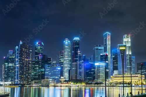 Poster abstract night cityscape of waterfront in singapore - can use to display or mont