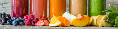 Selection of colourful smoothies on rustic wood background Poster
