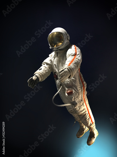 Astronaut in outer space, on a background of blue, infinite spac