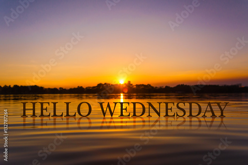 'HELLO WEDNESDAY ' with sunset water , twilight time