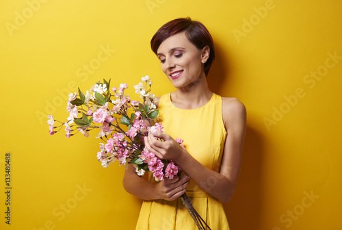 Bunch of flowers delighted woman