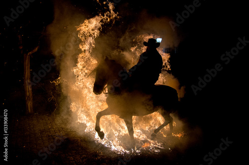 Horse rider through fire