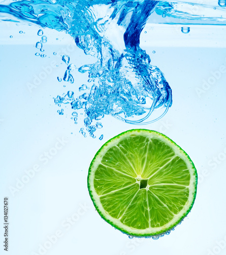 Lime dropped in a water