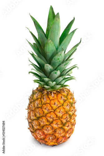pineapple with fresh green leaves isolated on white background