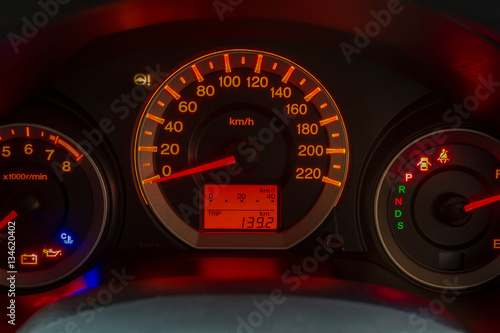 Poster Closeup of a tachometer and speedometer on a sports car dashboard